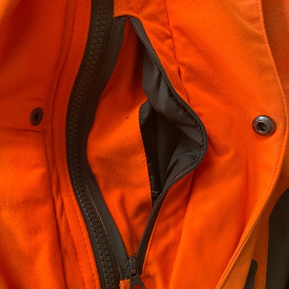 Redhead size Large, orange jacket with lots of zip up pockets. - Picture 3 of 5